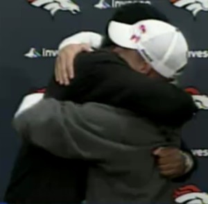 Sharing a hug at the press conference